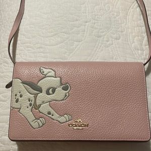 Is cute pinky Dalmata coach collection!!